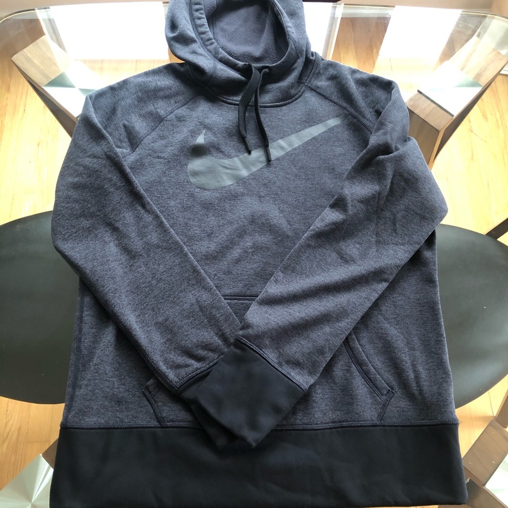 Women’s Nike Therma-Fit Sweatshirt.
